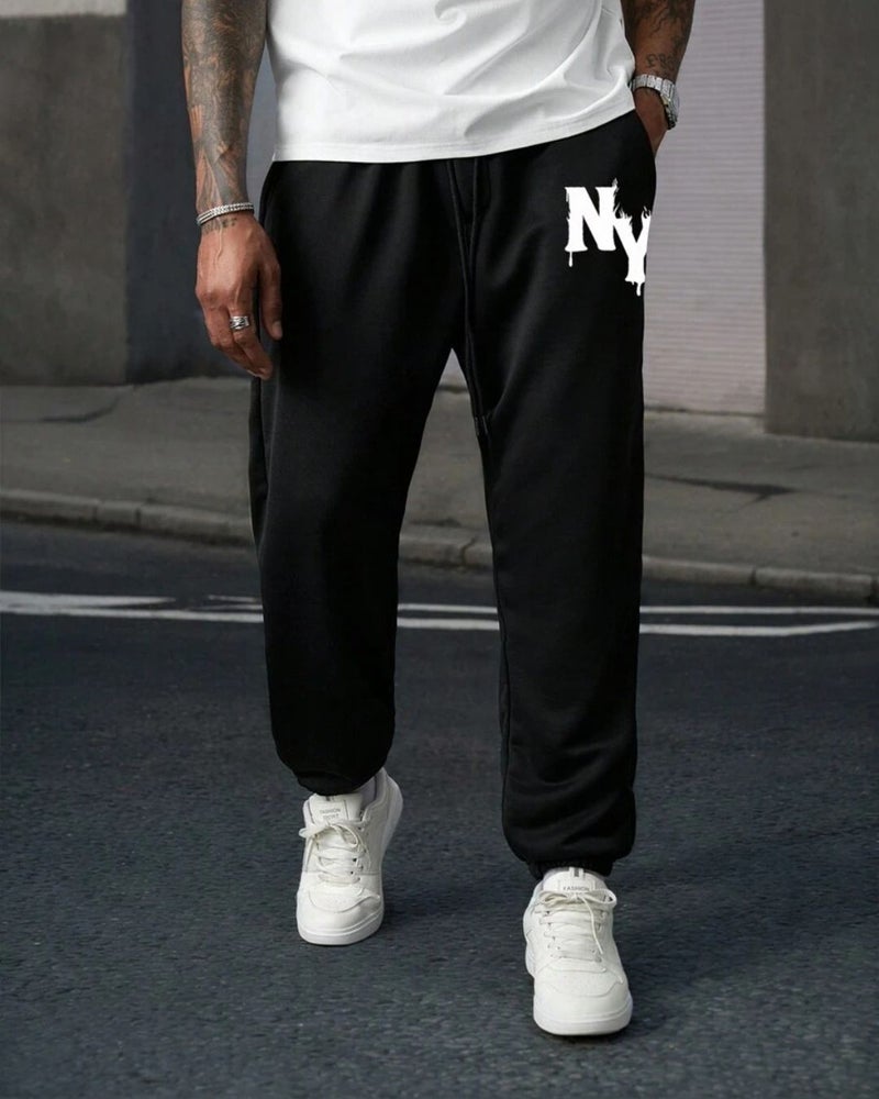 فلاينوف بنطلون جوغر رجالي أسود مطبوع بقصة فضفاضة - Image 1